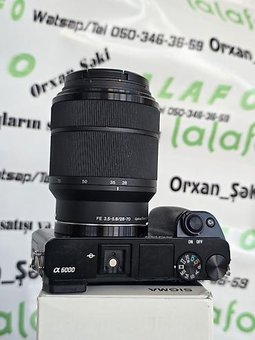 mini dv kamera: Sony Alpha a6000 aynasız fotoaparat + FE 28–70mm f/3.5–5.6 OSS — 1