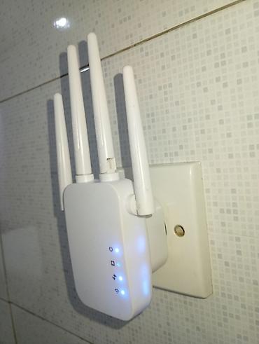 Modemlər və şəbəkə avadanlıqları: Wi‑Fi siqnal gücləndirici / range extender - Divar prizinə qoşulan — 3
