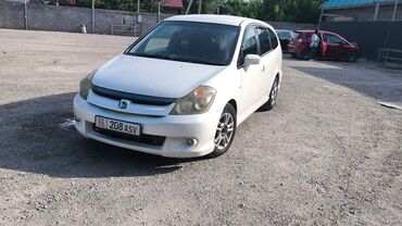Honda: Белый минивэн Honda Stream. Удобный и практичный автомобиль с
