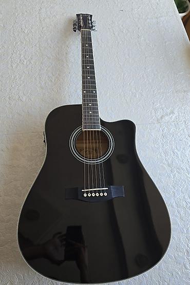Akustik gitaralar: QTE elektro -akustik gitara Gitara bir neçə aydır ki, məndədir. QTE — 2