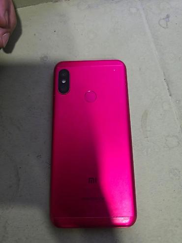 Мобильные телефоны и аксессуары: Xiaomi Mi A2 Lite, 64 ГБ, цвет - Красный, 
 Две SIM карты — 1