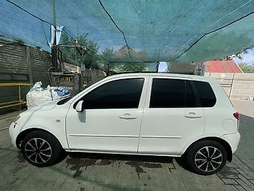 Mazda Demio: 2003 г., 1.3 л, Автомат, Газ, Хэтчбэк
