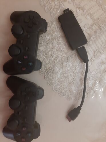 Digər oyun və konsollar: Salam game stick satilir 64 gb 2 geympad 4 aydi alinib hərşey əla