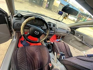 передвижные дома: Mazda Familia: 2001 г., Бензин, Хэтчбэк — 9