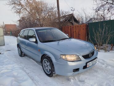 новый шин: Mazda 323: 2001 г., 1.6 л, Механика, Бензин, Хэтчбэк