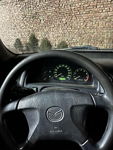 Mazda: Mazda Capella: 2000 г., 1.8 л, Механика, Бензин, Универсал — 14