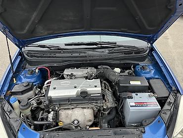 Kia: Kia Rio hatchback - Kuzov: 5 qapılı hatchback, mavi rəng - Mühərrik — 5