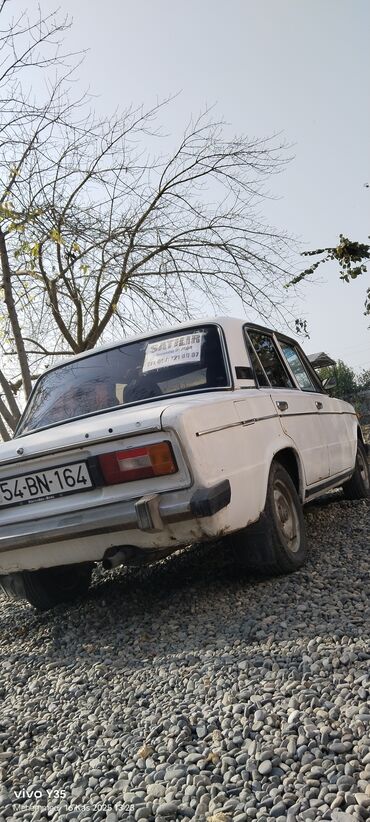 VAZ (LADA): VAZ 2106 (klassik “Jiguli”) – ağ rəngli sedan Xarici: - Dördgöz ön — 13