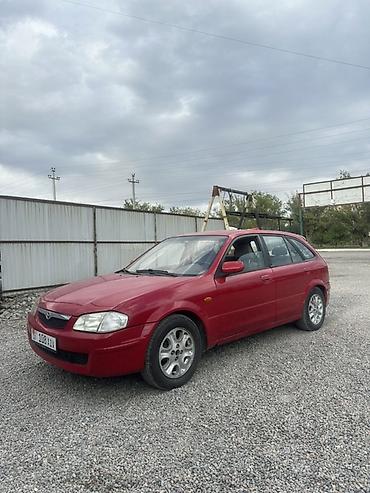 bmw e32: Mazda 323: 1998 г., 1.5 л, Механика, Бензин, Хэтчбэк — 1
