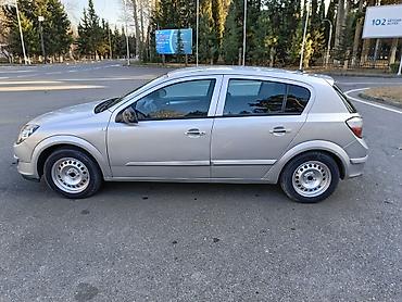 Opel: Opel Astra H – gümüşü rəng, 5 qapılı hetçbek.Hazır maşındı.ikinci — 5