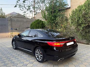 mitsubishi lancer evolution: Hyundai Grandeur: 2.2 l | 2015 il Sedan — 2