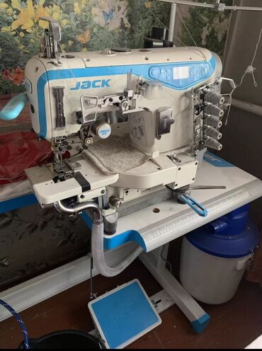 Промышленные швейные машинки: Распошивальная машина с обрезкой левого края автомат для подшива низа