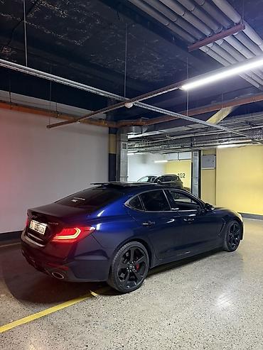 Другие автомобили: Редкая модификация Genesis G70, темно-синий седан бизнес‑класса с — 1