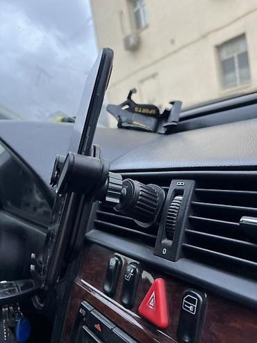 zaslonka nedir: Avtomobil üçün hava çıxışına taxılan telefon tutacağı. Stokda cəmi — 7