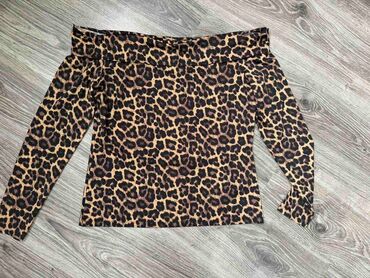 Bluze: H&M, L (EU 40), Leopard, krokodil, zebra na lalafo.rs Bluze: H&M, L (EU 40), Leopard, krokodil, zebra