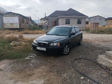 mercedes банан чёрного цвета: Hyundai Elantra: 2004 г., 1.6 л, Механика, Бензин