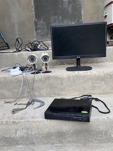 Фото и видеокамеры: Təhlükəsizlik kamera sistemi komplekti Tərkib: - LG monitor (təxminən — 2