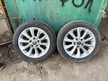 2106 masin: Toyoto corolla 2024 ci ilin orjinal disk tekerleri,hec bir problemi — 1