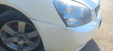 90 fa 373: Kia Optima: 2.7 l | 2008 il Sedan — 6
