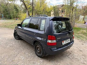 ann chery: Mazda Demio: 2001 г., 1.5 л, Механика, Бензин — 6