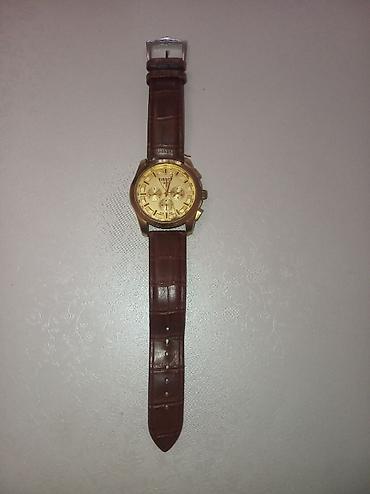 saat samdan: Tissot kişi qol saatı - Korpus: qızılı rəngli yuvarlaq metal korpus — 4