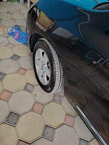 mercedes disk per page 40: Kia Carens: 0.2 l | 2008 il Sedan — 6