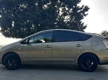 yem qıran: Toyota Prius: 1.5 l | 2007 il Sedan — 2