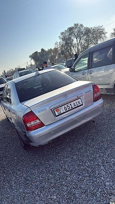 forester 2004: Mazda 323: 2003 г., 1.3 л, Механика, Бензин, Седан — 4