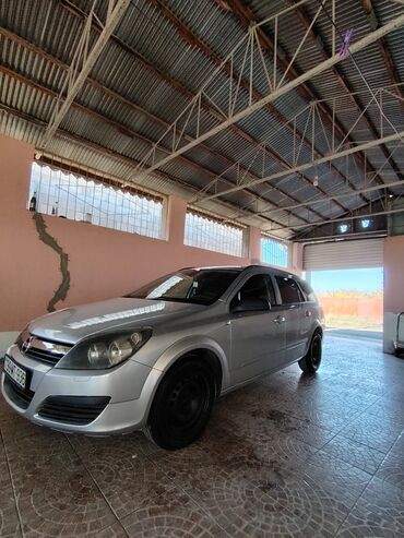 Opel: Opel Astra H hatchback – gümüş rəng. Əsas xüsusiyyətlər: 2006 furqon — 8