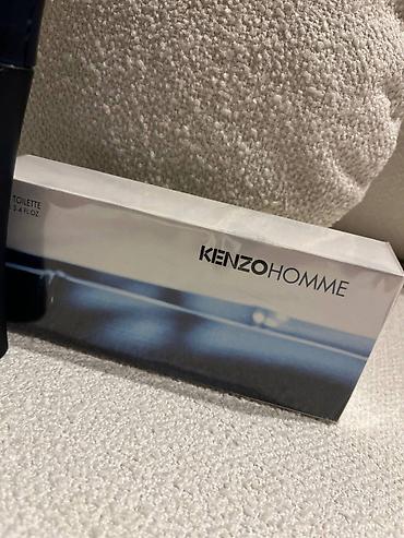 hugo: Slika prikazuje muški miris Kenzo Homme, poznat po svojoj — 3