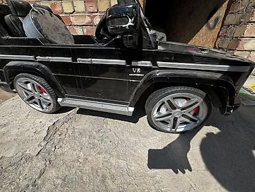 Детские электрокары: Детский электромобиль в стиле Mercedes-Benz G‑Class (G55/AMG), черный — 9