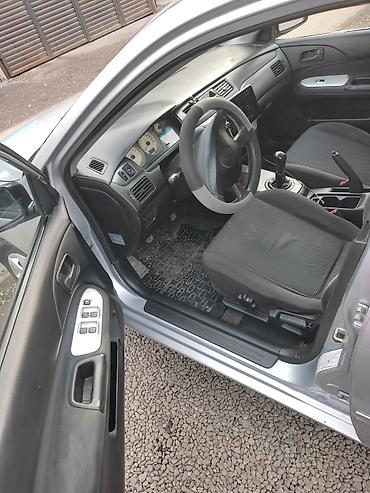 Mitsubishi: Mitsubishi Lancer: 2005 г., 1.3 л, Механика, Бензин, Седан — 15