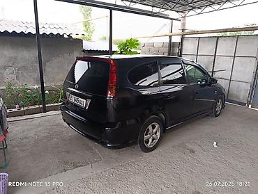 step vagon: Honda Stream: 2003 г., 1.7 л, Автомат, Минивэн — 1