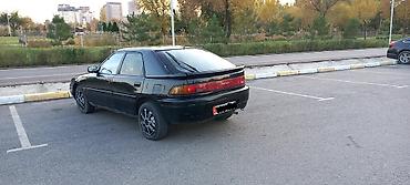 mazda hedos: Mazda 323: 1990 г., 1.8 л, Механика, Хэтчбэк — 4