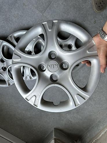набор ключ 94: Комплект оригинальных колпаков KIA (4 шт.) R14 — 2