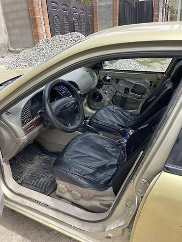 дэу матиз 1: Daewoo Nubira: 1999 г., 1.5 л, Кол менен иштөөчү, Бензин, Седан — 5