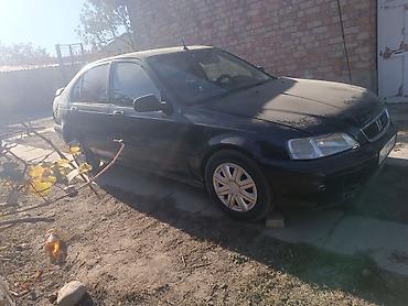 дайхатсу куоре 1991: Honda Civic: 1999 г., 1.6 л, Механика, Бензин, Седан — 4