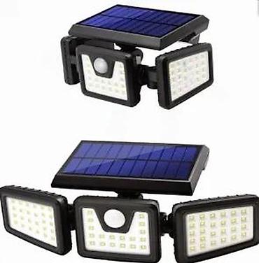 sto: Solarna LED reflektorska lampa sa 3 podesiva panela i senzorom pokreta — 1