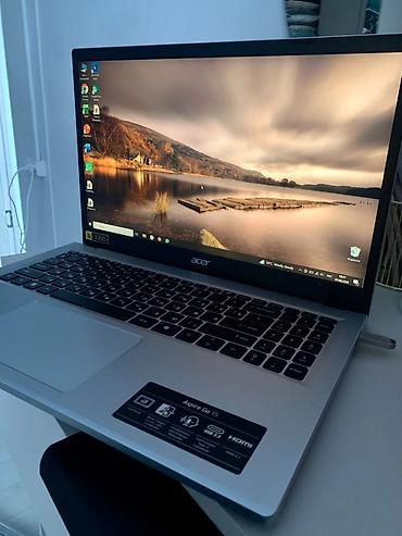 windows surface: Acer Aspire Go 15 — тонкий 15.6" ноутбук для учебы, работы и — 1