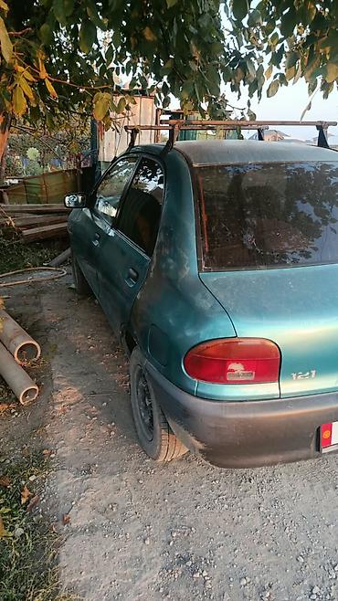 mazda 3: Ford : 1991 г., Механика, Бензин, Хэтчбэк — 3