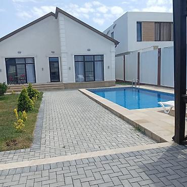 Bağ evlərinin kirayəsi: Bağ evi kirayə verilir, Mərdəkan Mərdəkanda yerləşən isti, hovuzlu bağ — 2