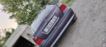 Opel: Tünd göy rəngdə olan Opel Vectra sedanı. Bu avtomobil rahat və — 10