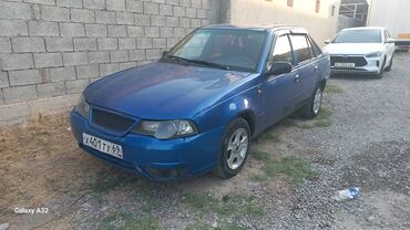 электро авто бишкек: Автомобиль Daewoo Nexia синего цвета, представленный в кузове седан