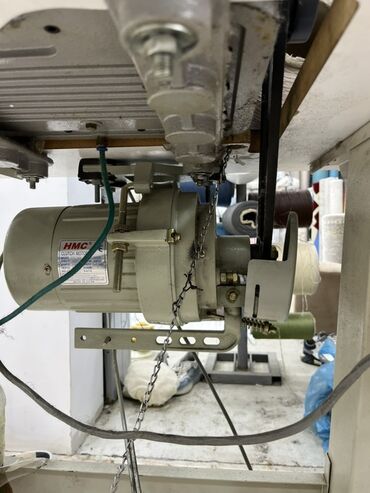 Digər istehsal avadanlığı: Xalça kənarı vurma (overlok) avadanlığı və iri həcimli sap bobinləri — 7