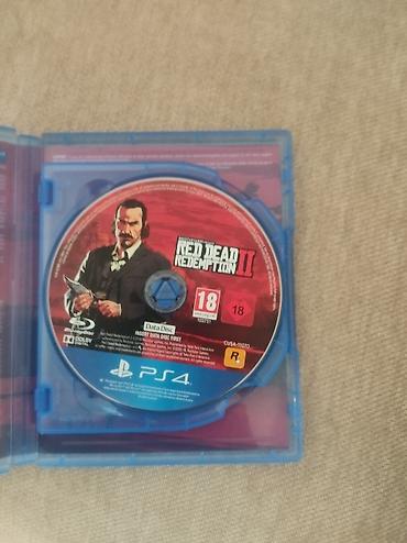 Видеоигры и приставки: Игра Red Dead Redemption II для PlayStation 4 (диск, коробочное — 2