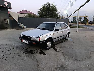 Унаа сатуу: Mazda 323: 1985 г., 1.5 л, Кол менен иштөөчү, Бензин, Хетчбек — 1