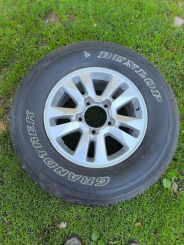 dio 27: Колесо в сборе: шина + литой диск. - Шина: Dunlop Grandtrek AT23 - — 1