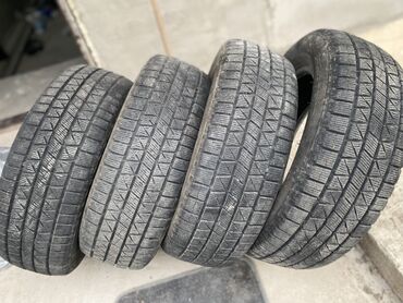колесо от тачки: Комплект зимних шин (4 шт.) - Размер: 205/60 R16 шишек нет качество