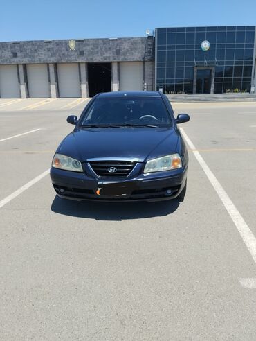 Hyundai Elantra: 1.6 л | 2005 г. Седан
