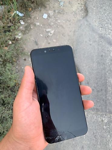 honor 200 lite qiyməti: Xiaomi Mi A2, 128 GB, rəng - Qara, 
 Barmaq izi, İki sim kartlı — 3